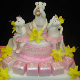Two Tier Musical Pigs & Daffodil Christening Cake