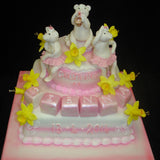 Two Tier Musical Pigs & Daffodil Christening Cake